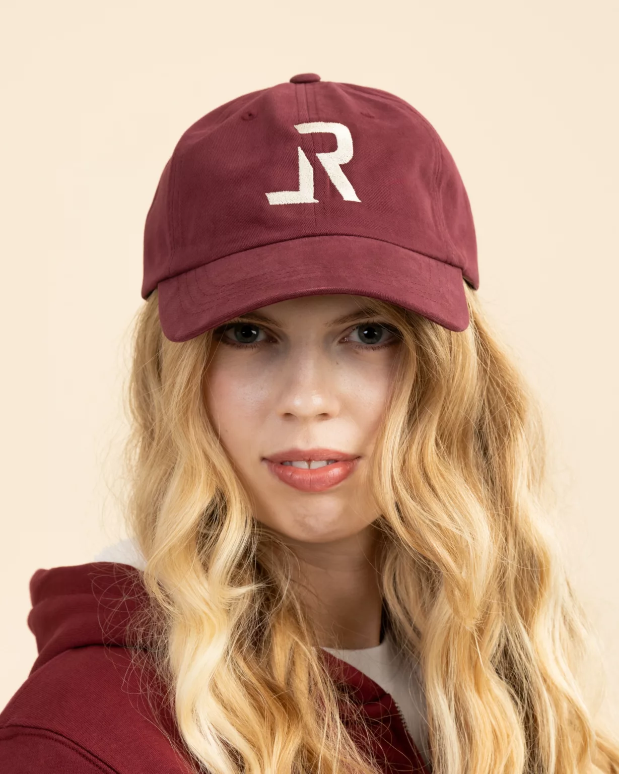 LavendersRanch (LR) Burgundy red cap worn by a woman, sustainably made, western and country style.