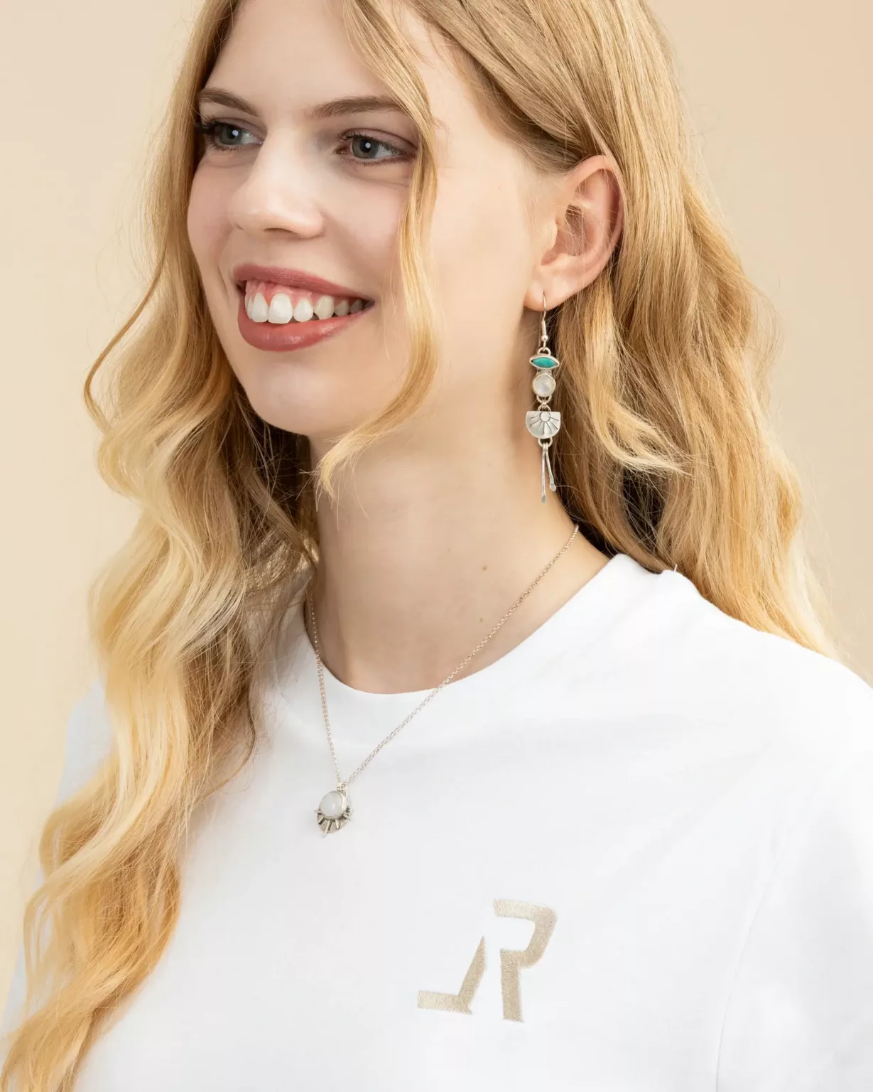 Handcrafted Moonshine earrings made of 925 sterling silver by LavendersRanch (LR) featuring turquoise from a small mine in Mexico and rainbow moonstone, styled with a matching sterling silver moonstone necklace in a western boho look.